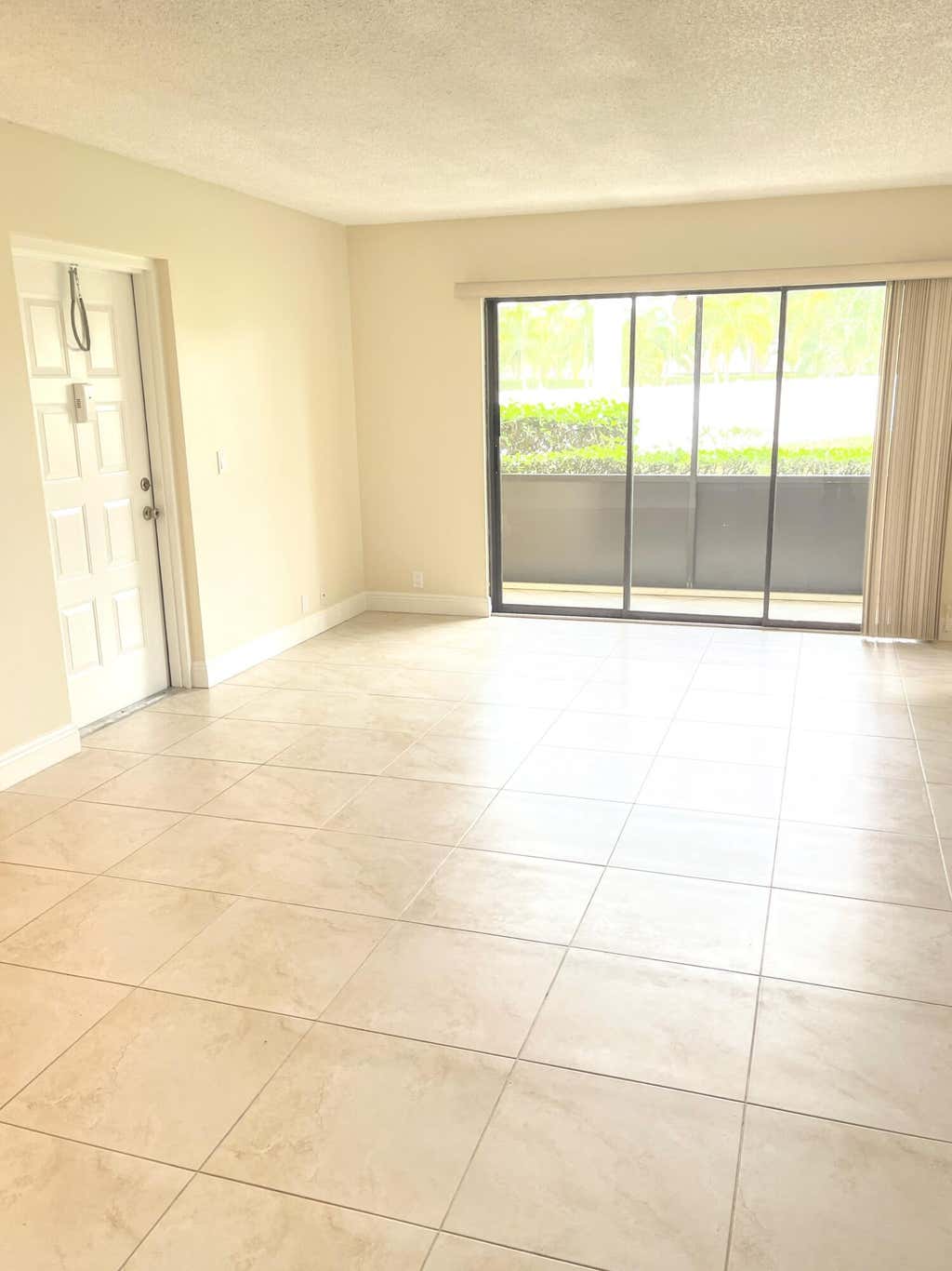 Photo of 801 Sky Pine Way #F1, Greenacres, FL 33415 (MLS # R10974545)
