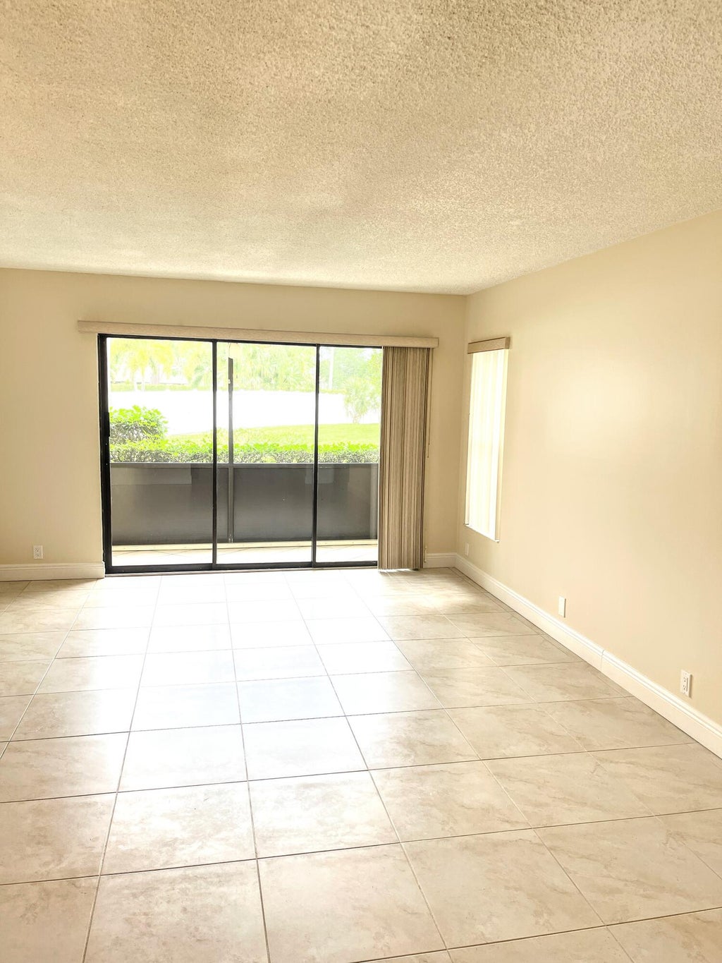 Photo of 801 Sky Pine Way #F1, Greenacres, FL 33415 (MLS # R10974545)