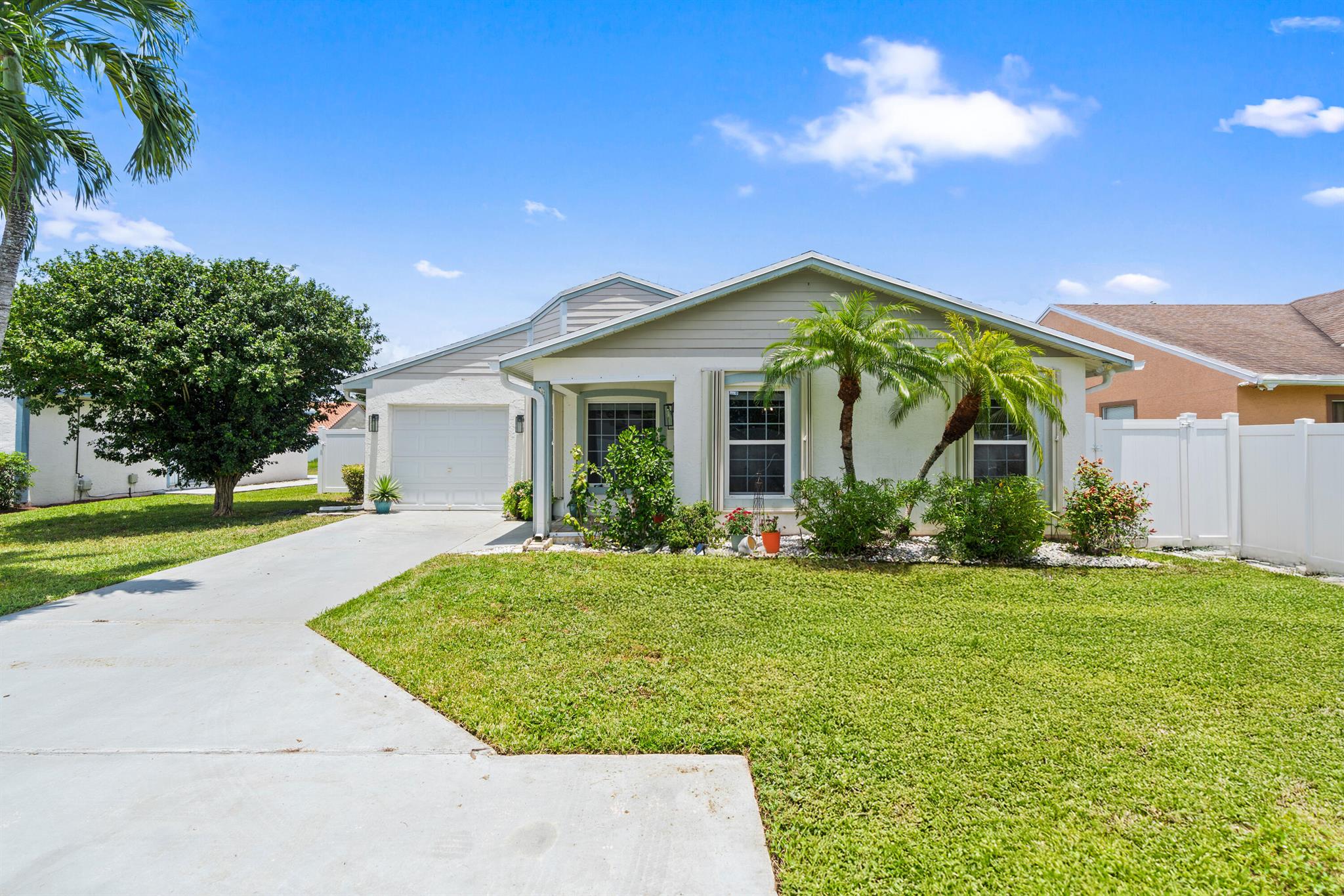 Move right into this beautifully updated 3/2 home on oversized lot in a top-rated school district! Featuring a new 2025 A/C, 2022 roof, 2021 solar panels, 2024 hot water heater, impact front door, and recessed lighting throughout. Enjoy a cook's kitchen w/ new stainless appliances and a wine fridge, vaulted ceilings, California closets thrghout, 2 sets of French doors, and a stunning, oversized screened-in porch w/ a flat-screen TV. The fully fenced backyard is perfect for kids, pets, and a pool. Garage w/ 2025 garage door opener, epoxy floor, plus parking for 5. Community offers a pool, tennis & pickleball. Just minutes from world-class shopping and amenities!