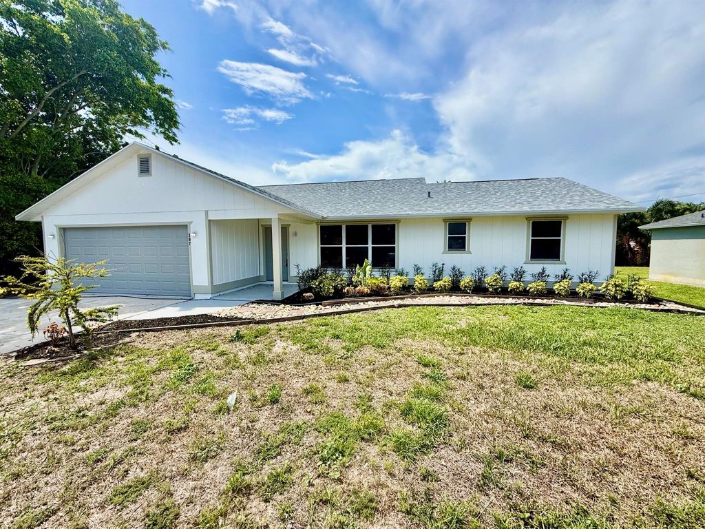 Photo of 397 SE Huron Terrace, Port Saint Lucie, FL 34983 (MLS # R11095266)
