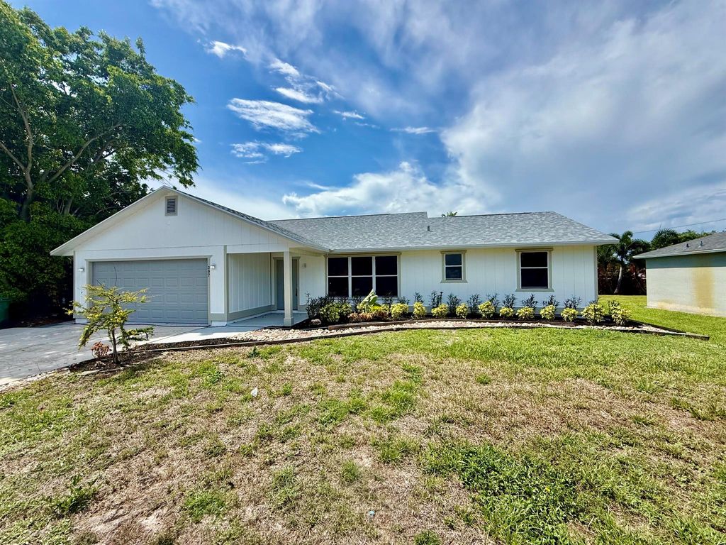 Photo of 397 SE Huron Terrace, Port Saint Lucie, FL 34983 (MLS # R11095266)