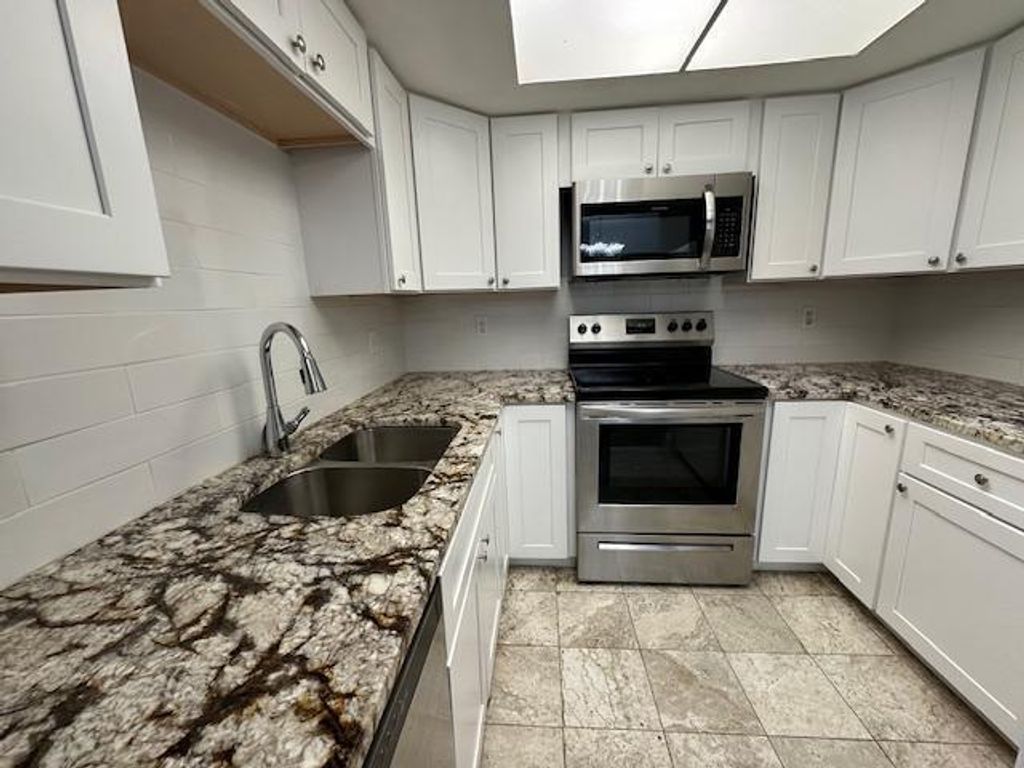 Photo of 10290 N Military Trail #3b, Palm Beach Gardens, FL 33410 (MLS # R11107080)