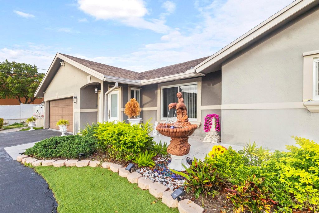 Photo of 4040 NE 6th Avenue, Deerfield Beach, FL 33064 (MLS # B26015050)