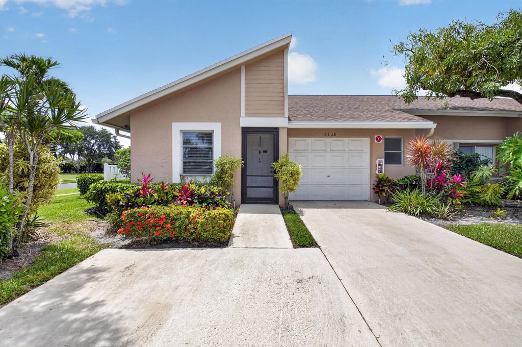 Photo of 8130 Springtree Road #A, Boca Raton, FL 33496 (MLS # B26027971)