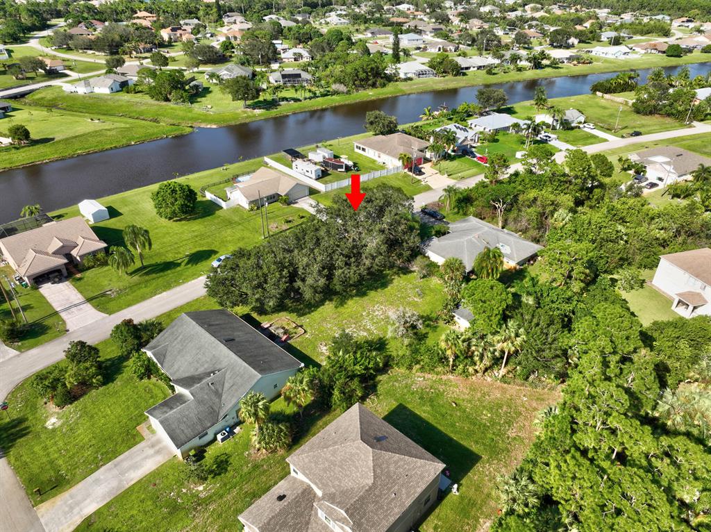 Build your dream house on this gorgeous .24 acres (10,524 sq. ft. ) grassed lot with 3 large oak trees on the front and a 10 x 10 approx.ALSO SELLING HOME NEXT DOOR FOR $427,000 at 215 SW LAMA AVE.!!!!!There is also a permitted storage shed on property with chain link fence surrounding 3/4 of property and gate at the front. 1.5 miles from Turnpike/Becker Rd. No HOA.