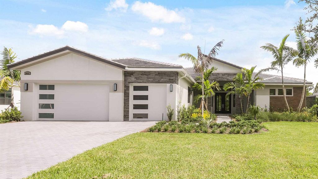 Photo of 5455 SW Pomegranate Way, Palm City, FL 34990 (MLS # R10979392)