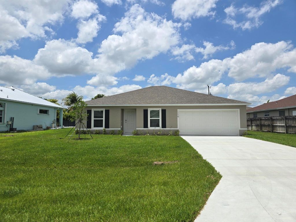 Photo of 1258 SW Century Avenue, Port Saint Lucie, FL 34953 (MLS # R11084889)
