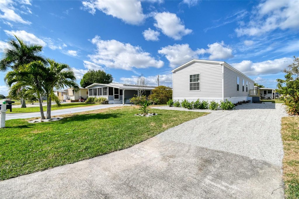 Photo of 8002 SE Skylark Avenue, Hobe Sound, FL 33455 (MLS # F10451994)