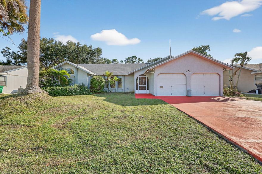 Welcome to this charming 3-bedroom, 2-bath,2-car garage pool home located in the heart of Port St. Lucie!The spacious kitchen features abundant cabinet space and a convenient pass-through window- perfect for entertaining family and friends. The oversized primary bedroom offers a relaxing retreat, while natural light fills the home, creating a bright atmosphere.Step outside to the screened-in patio overlooking the sparkling pool- ideal for year-round Florida living. The backyard also features a rare seleniferous grandifloras (Queen of the Night), a night blooming cactus that produces breathtaking flowers that open for just one magical evening.Conveniently situated near shopping, and dining, this home perfectly blends comfort, charm, and convenience.