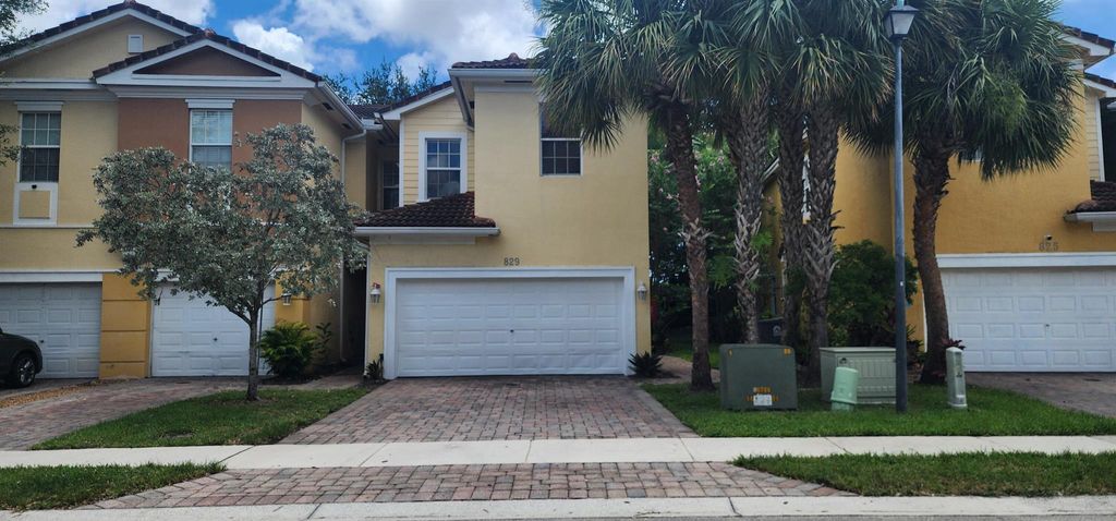 Photo of 829 Pipers Cay Drive, West Palm Beach, FL 33415 (MLS # R11096195)