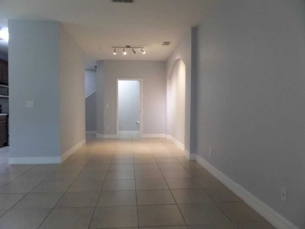 Photo of 829 Pipers Cay Drive, West Palm Beach, FL 33415 (MLS # R11096195)