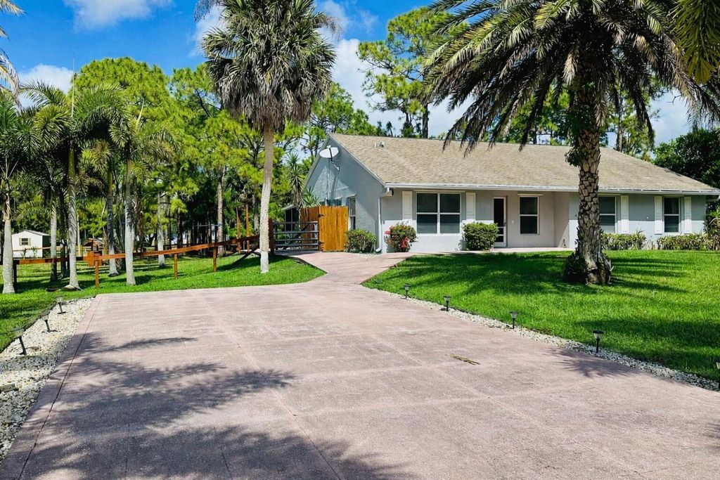 Photo of 14453 73rd Street N, Loxahatchee, FL 33470 (MLS # R11169471)