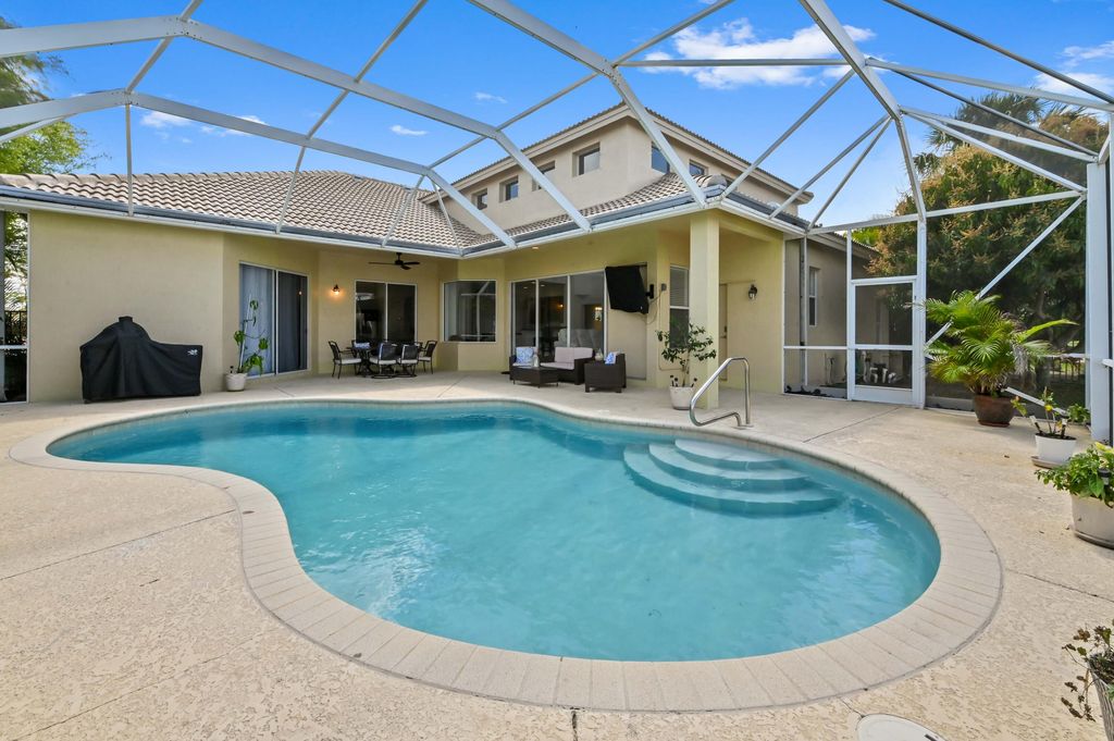 Photo of 3638 Hamilton Key, West Palm Beach, FL 33411 (MLS # B26001033)