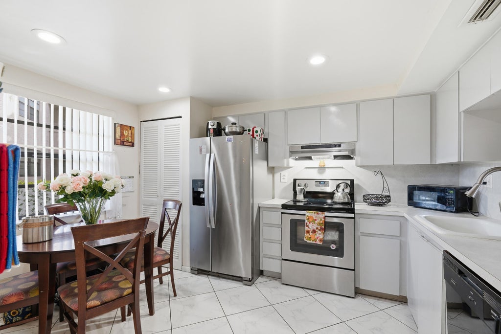 Photo of 1000 Colony Point Circle #110, Pembroke Pines, FL 33026 (MLS # B26083119)