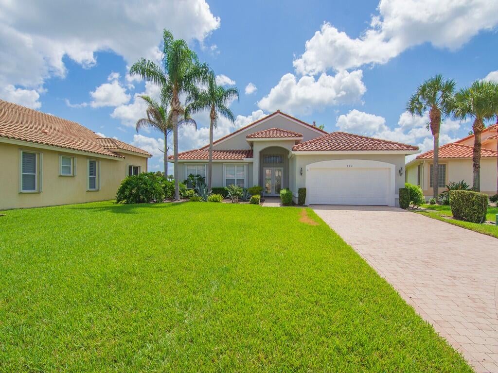 Photo of 204 NW Liseron Way, Port Saint Lucie, FL 34986 (MLS # B26066066)