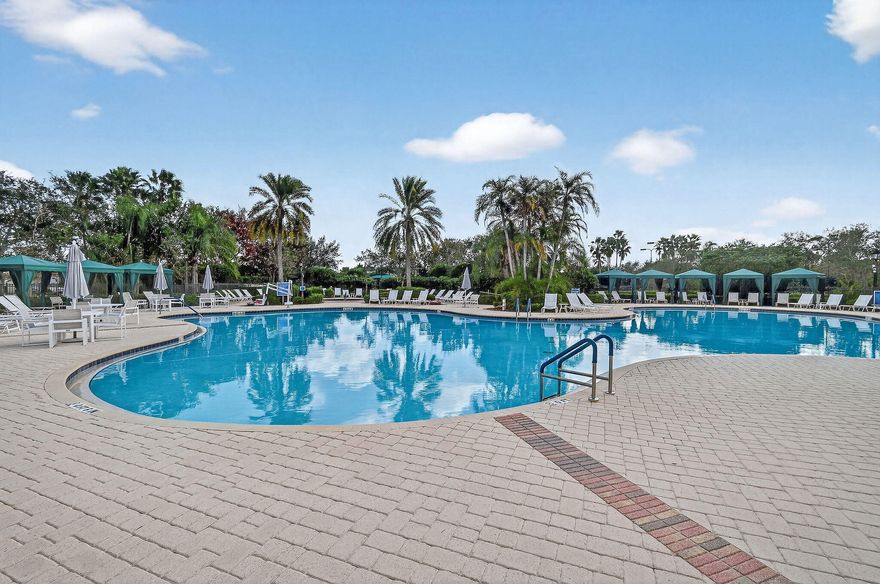 REDUCED! Enjoy life in this peaceful but active over 55 community. Pristine 3 bed, 2 ½ bath PLUS OFFICE, mudroom, Large ISLAND kitchen, one-touch custom blinds, neutral paint, TILE floors throughout, TWO master walk-in closets, IMPACT windows and doors, professional garage organizer, PRIVATE screened back patio. Community amenities: 2 heated pools, multi-million$ clubhouse, hot spa, waterpark, basketball, tennis, bocce, billiards, gym, yoga, game room, picnic areas, more! Walk to downtown Tradition, offering many festivals, activities and concerts, dozens of upscale neighborhoods with lakes, walking trails, parks, shopping, al fresco DINING, Cleveland Clinic HOSPITAL.  Nearby is GOLF, hiking, BEACHES, nightlife, BOATING, NY METS spring training and so much more. PBIA only 50 minutes. HOA Includes almost everything! Blue Stream Fiber is your local provider for super-fast Internet, TV, phone and home security services to the residents of the various Tradition communities, included in your HOA payment. Additionally, lawn mowing, edging, trimming, irrigation \  irrigation system and exterior pest control are all included.  FURNISHED:  Two of the three bedrooms are furnished, plus an office, the eat-in-kitchen dinette set and the living room set, and the wall mounted television are all included in the sale.  Mrs. Clean lived here and the place is spotless.  Bring your clothes and toothbrush and be ready to enjoy the good life in sunny Florida.