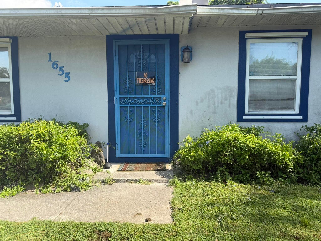 Photo of 1655 SW Escobar Lane, Port Saint Lucie, FL 34953 (MLS # B26072458)