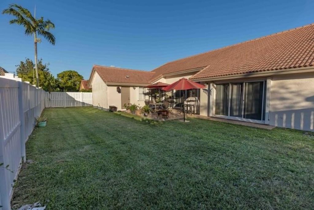 Photo of 590 NW 161st Avenue, Pembroke Pines, FL 33028 (MLS # F10543357)