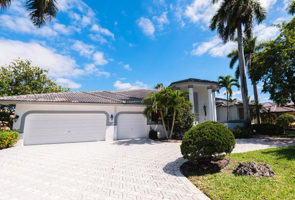 Photo of 12157 NW 9th Drive, Coral Springs, FL 33071 (MLS # B26018977)