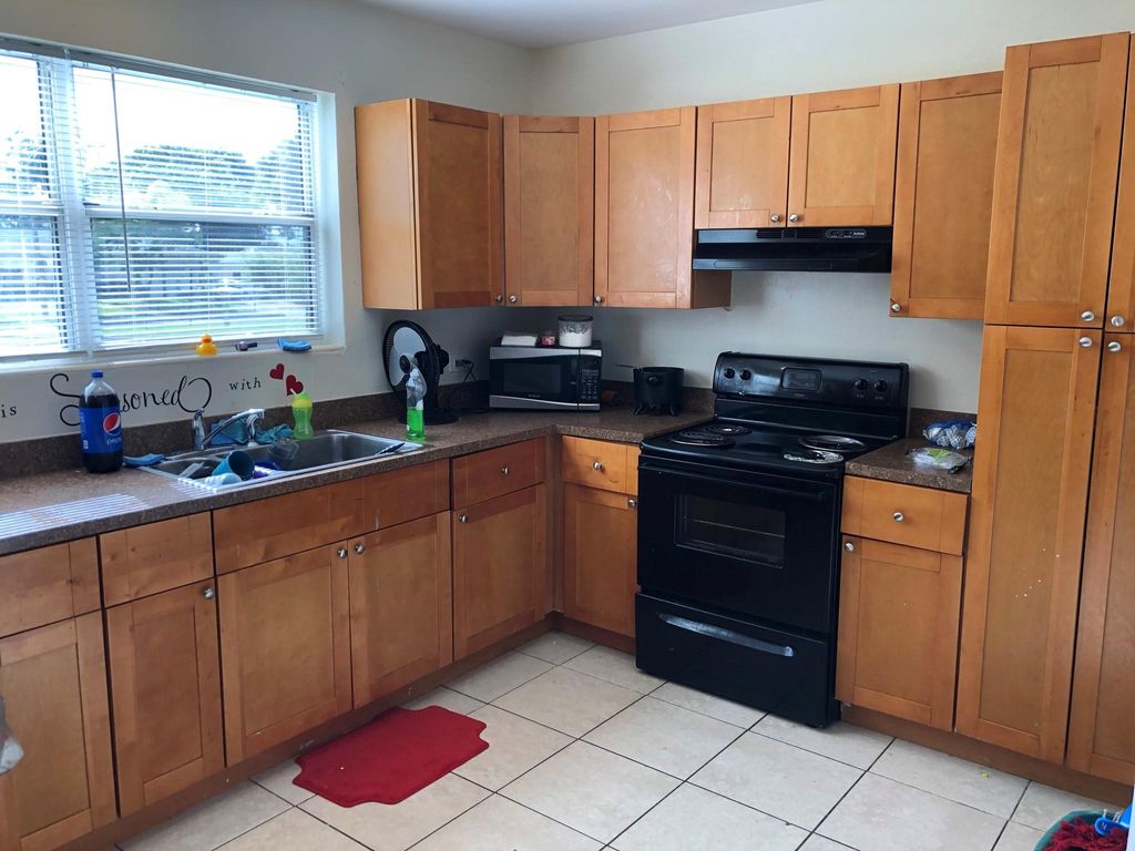 Photo of 861 36th Street, West Palm Beach, FL 33407 (MLS # F10499897)