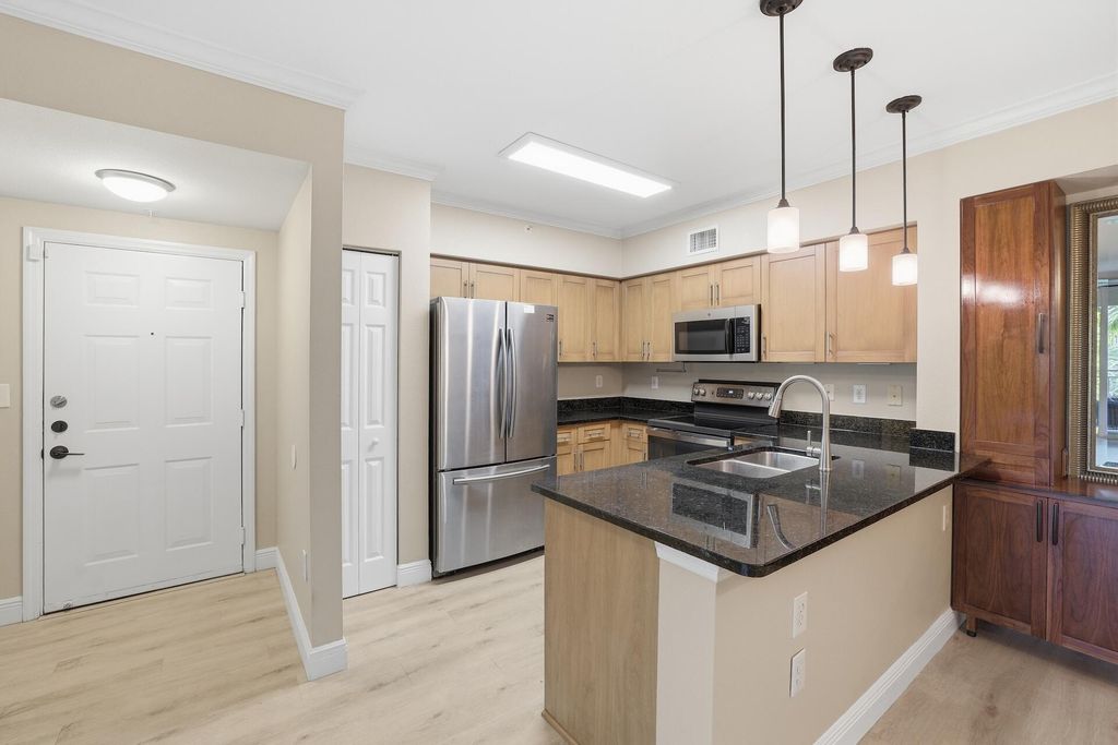 Photo of 6559 Emerald Dunes Drive #308, West Palm Beach, FL 33411 (MLS # B26019713)