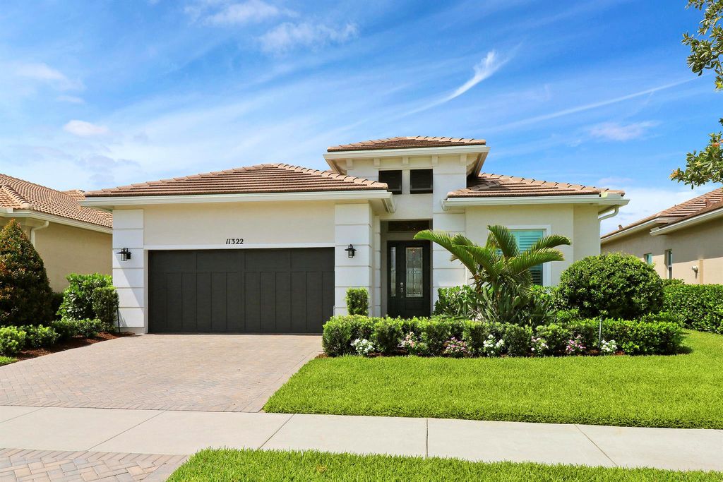 Photo of 11322 SW Lunata Way, Port St Lucie, FL 34987 (MLS # R10915033)