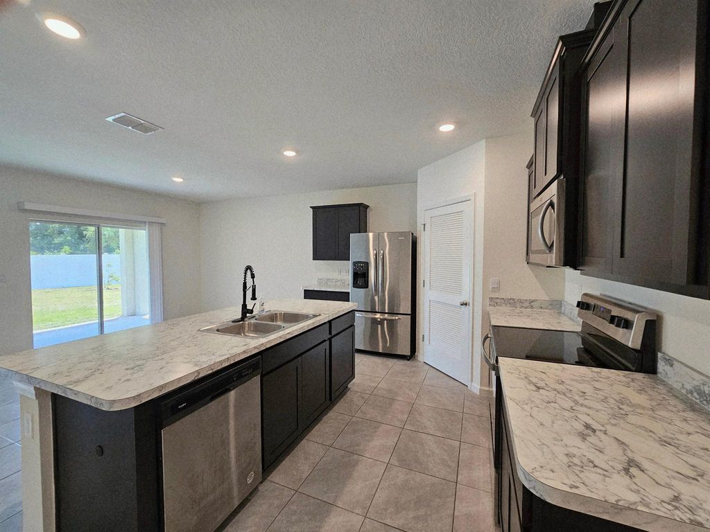 Photo of 2549 SW Grotto Circle, Port Saint Lucie, FL 34953 (MLS # R11111606)
