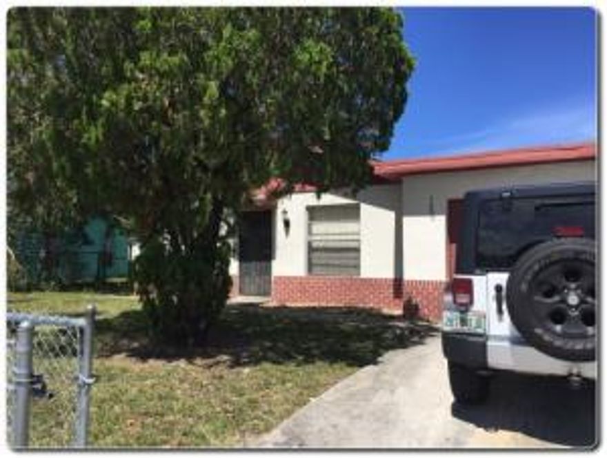 GREAT OPPORTUNITY FOR A 4 BED 2 BATH SINGLE FAMILY LOCATED ON LARGE CORNER LOT.  CENTRALLY LOCATED NEAR SHOPPING, SCHOOLS AND DINING. GARAGE HAS BEEN CONVERTED TO 4TH BEDROOM, COULD BE CONVERTED BACK TO 1 CAR GARAGE.