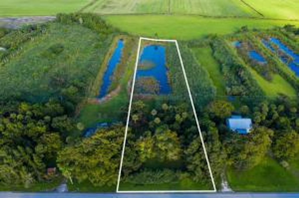 Photo of 19001 SW Conners Highway, Canal Point, FL 33438 (MLS # R10715702)