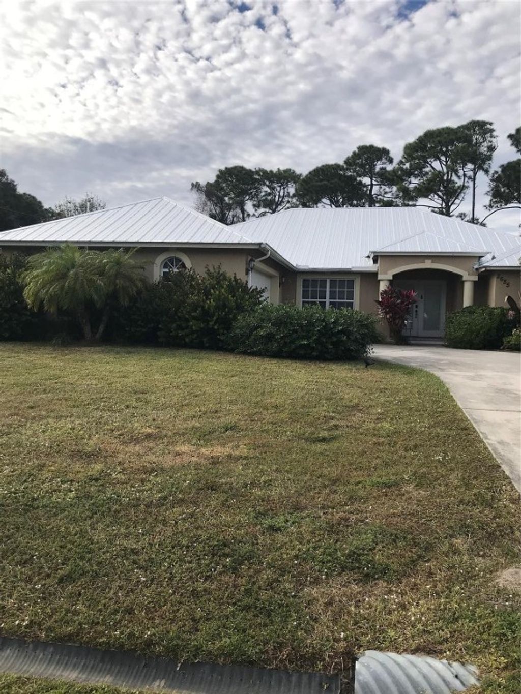 Photo of 2685 SW Acco Road, Port Saint Lucie, FL 34953 (MLS # F10548337)