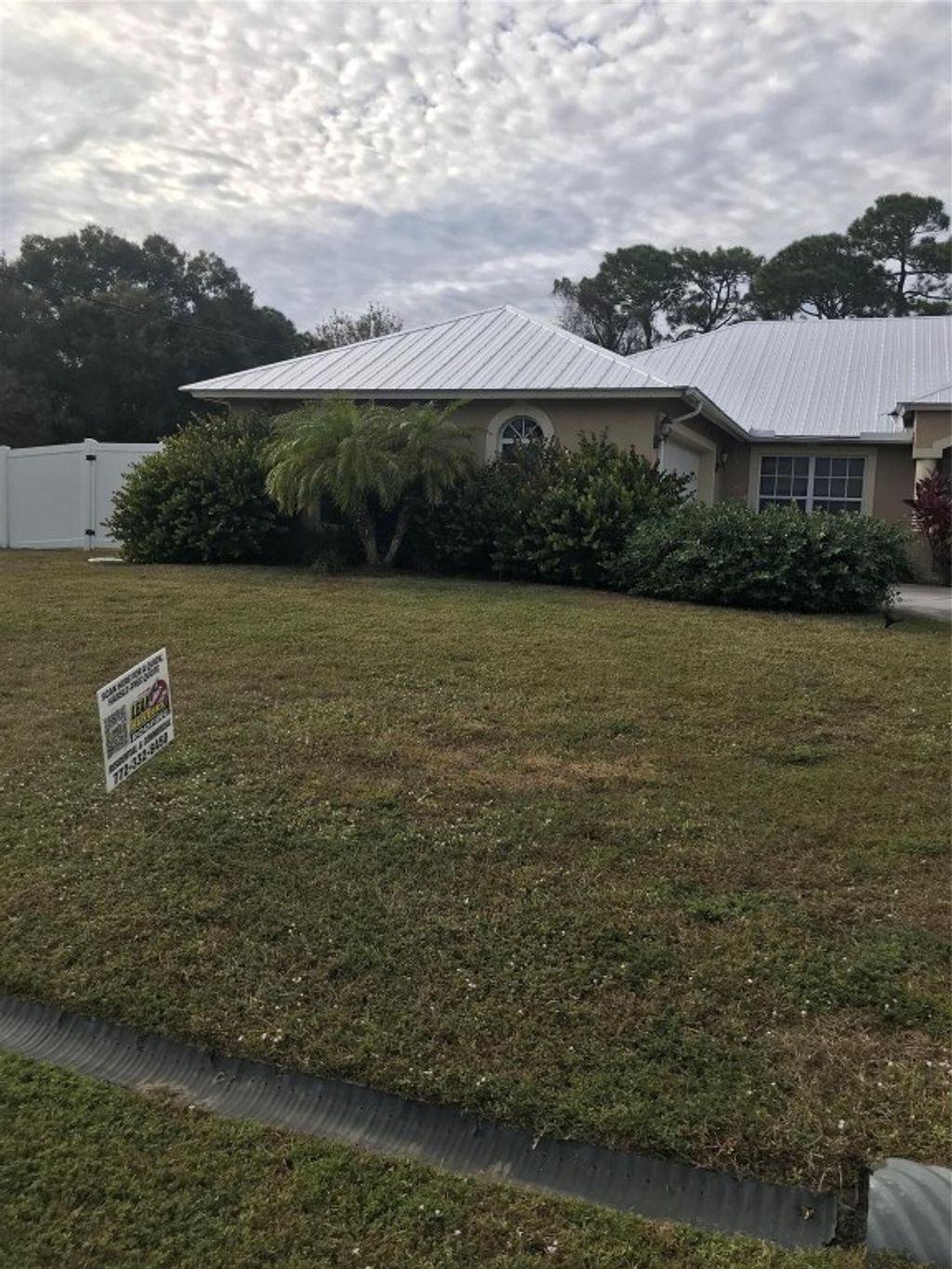 Photo of 2685 SW Acco Road, Port Saint Lucie, FL 34953 (MLS # F10548337)