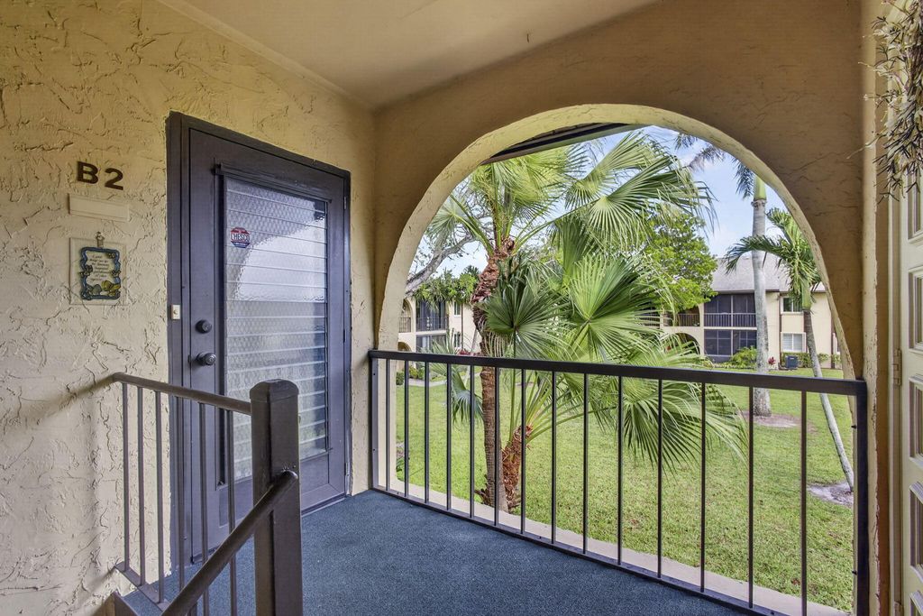 Photo of 301 Pine Ridge Circle #B-2, Greenacres, FL 33463 (MLS # B26016237)