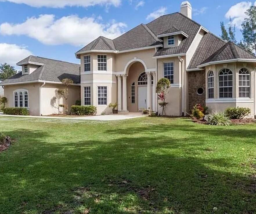 Welcome to this beautifully maintained 6-bedroom, 3.5-bathroom home located on nearly an acre in South Florida -- no HOA and minutes from North Broward Prep.Spacious layout that includes a den, formal dining room, oversized family room, soaring ceilings, and a smart Alexa-enabled home system, this residence is as functional as it is elegant. The downstairs primary suite opens to a sparkling saltwater pool with waterfalls and gazebo -- perfect for entertaining or relaxing in private tranquility.Balconies overlook the fully fenced yard with plenty of room for RVs, boats, or future expansion. Large walk-in closets, abundant storage, and a 3-car garage make this home ideal for modern living.Motivated seller