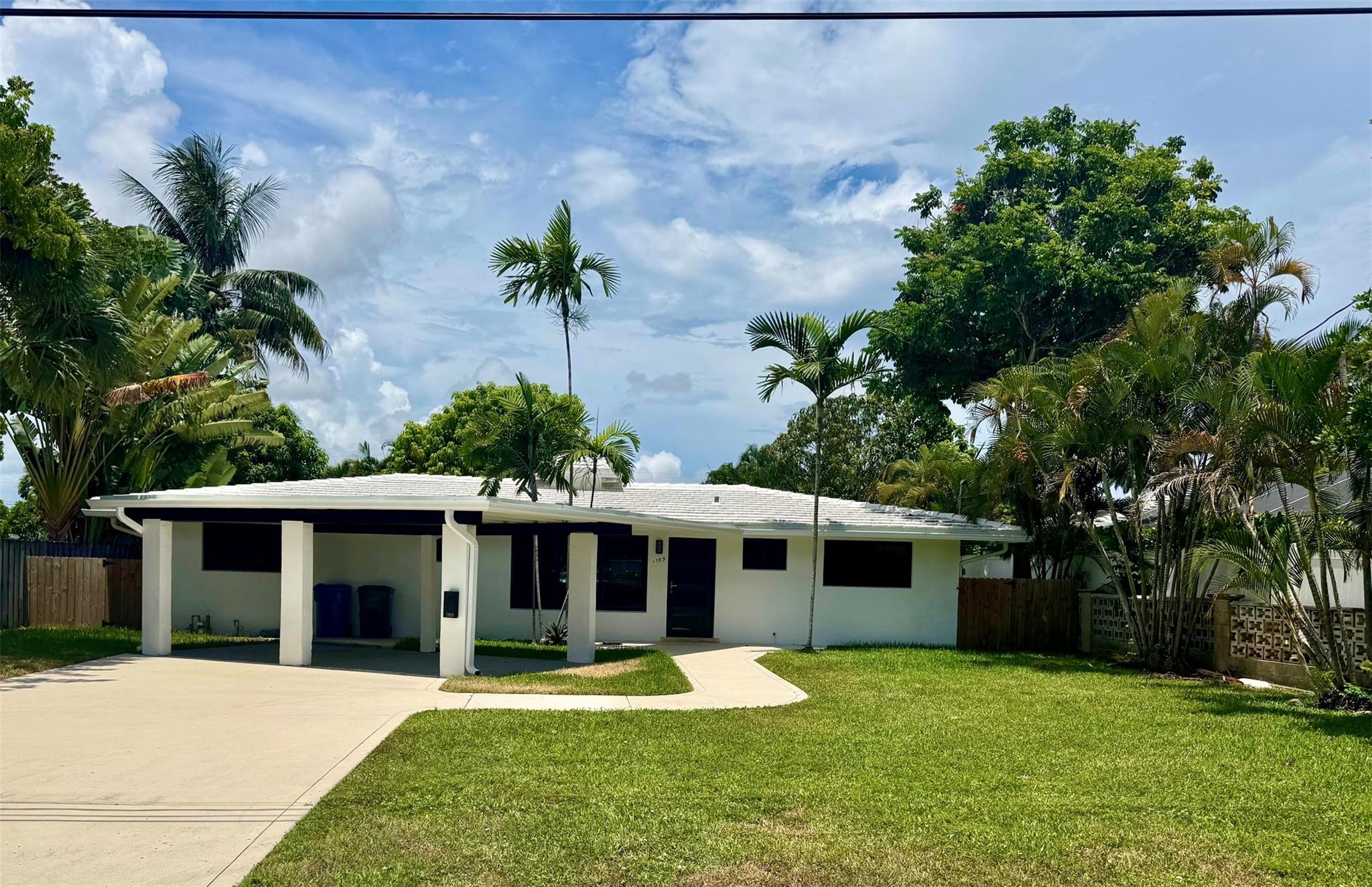 Completely update 3 bedroom, 2 bath, waterfront home on quite street in one of Fort Lauderdale's hottest locations. Designer finishes throughout. Home was completely remodeled with new roof, new electrical, all new impact doors and windows, new aC, new kitchen with beautiful matte white with bronze appliances, gas range, porcelain flooring, new designer bathrooms and more! Beautifully designed open floor plan with incredible natural light. Enjoy the nice water view in the private backyard with room for a pool.
