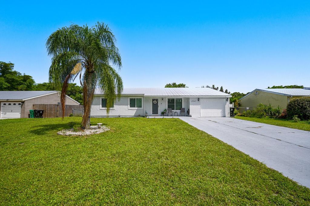 Photo of 2043 SE New York Street, Port St Lucie, FL 34952 (MLS # R10905284)