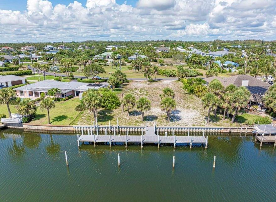 Beautiful lot on the barrier island. Deep water dock. Only written offers will be presented.