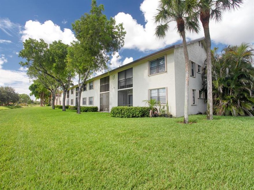 Nice unit in attractive neighborhood in West Boca. Located in 18th street and Lyons Rd. Full size Washer and dryer inside unit. Hurricane accordion shutters, nice view from screened patio with hurricane roll-down shutter. Laminate and tile only, no carpet. Stainless steel appliances, storage Bin , Lot of green area. Community pool. Excellent location, a couple of blocks from Walmart Supercenter, Target, Lowes. See above school information for High Rated schools