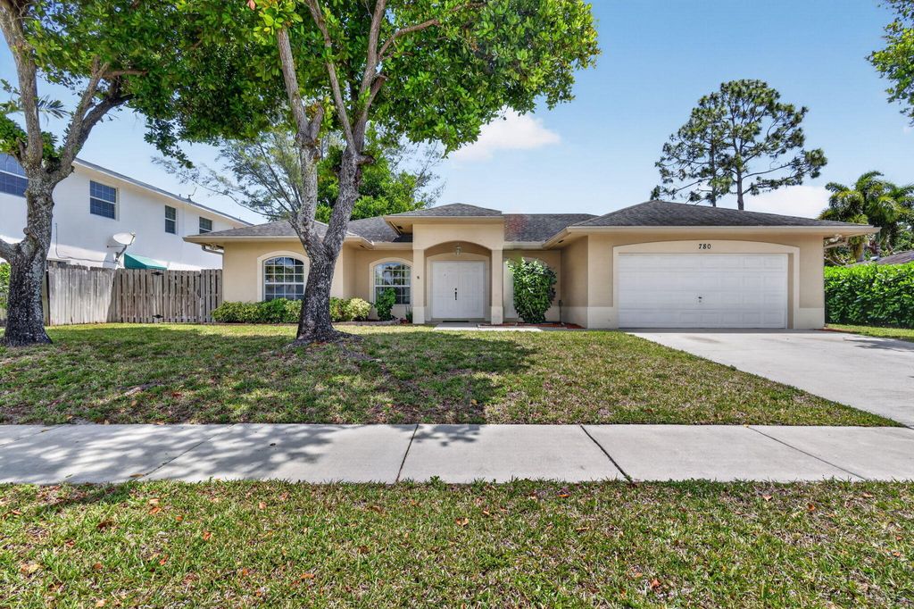 Photo of 780 Orchid Drive, Royal Palm Beach, FL 33411 (MLS # B26020826)