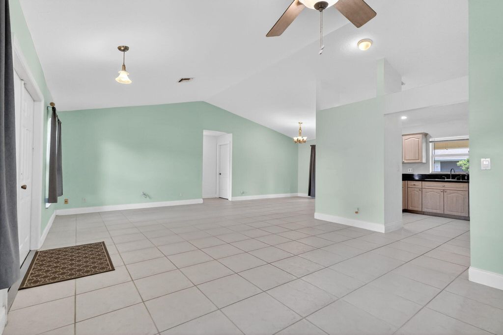 Photo of 780 Orchid Drive, Royal Palm Beach, FL 33411 (MLS # B26020826)