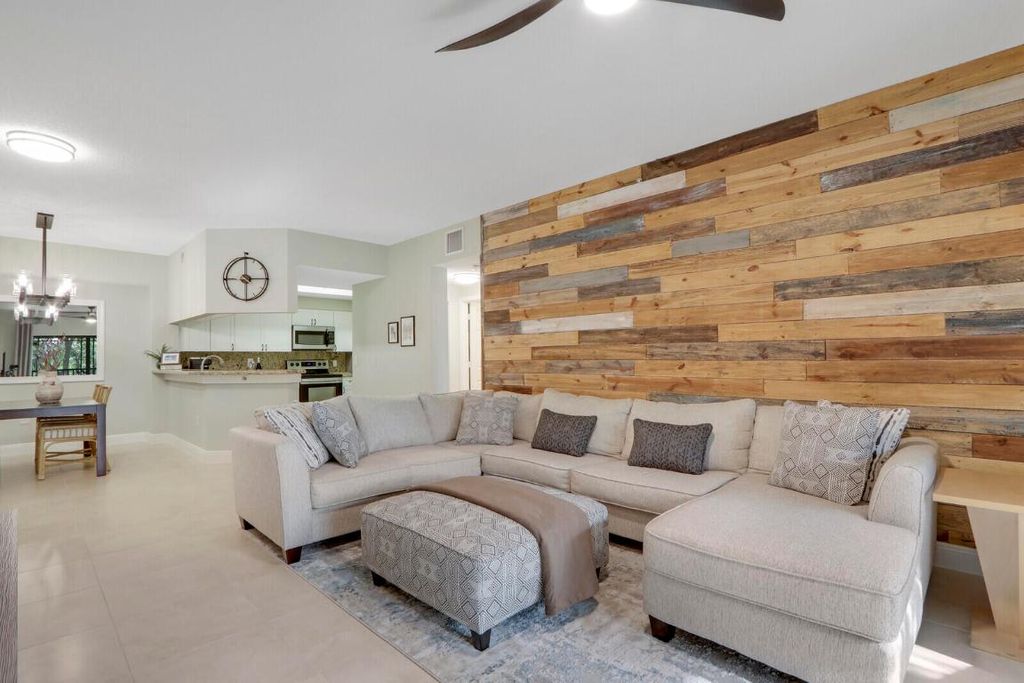 Photo of 3023 Alcazar Place #302, Palm Beach Gardens, FL 33410 (MLS # R10975354)