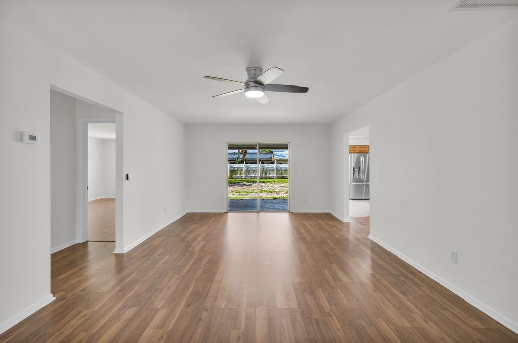 Photo of 434 SE Langfield Avenue, Port Saint Lucie, FL 34984 (MLS # F10506258)