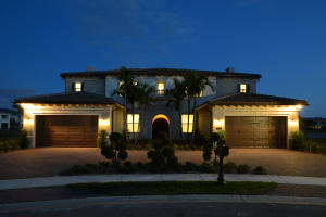 The epitome of Boca Raton luxury. Magnificently sited on over half an acre lot in The Oaks, Boca Raton's most coveted community. This estate home boasts lake front vistas from almost every room. Featuring 6 bedrooms and a large media room and office. 4 car garage with a circular driveway nestled on a quiet cul de sac. Inside the exquisite front doors is the grand glass double staircase inviting you into the home. Upon entering you will note Orion white 24'' marble and premium dark hardwood floors throughout the home. A professional chefs dream kitchen with an oversized island and Viking Gas appliances, 6 gas burner range and double wall oven with a warming drawer. A butler's pantry connects the kitchen to the formal dining area.