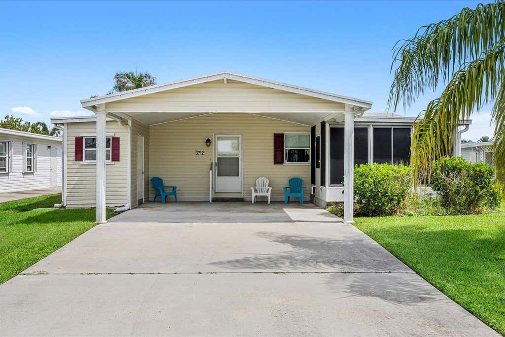Photo of 3712 Crabapple Drive, Port Saint Lucie, FL 34952 (MLS # B26063415)