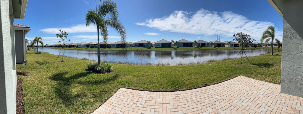 Photo of 13630 SW Oceanus Boulevard, Port Saint Lucie, FL 34987 (MLS # R10960268)