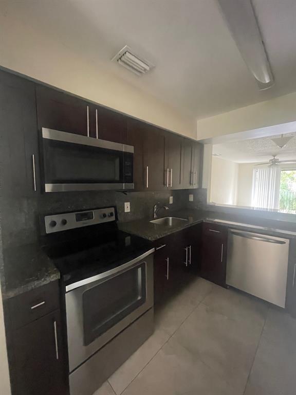 Beautifully remodeled 2 bedroom in Coral Springs! Tile throughout, granite in kitchen, washer and dryer in unit! Open back patio. Your clients will love it! Rapid approval and move in possible. Tenant must agree to rent paid via automatic withdraw form bank (ACH)