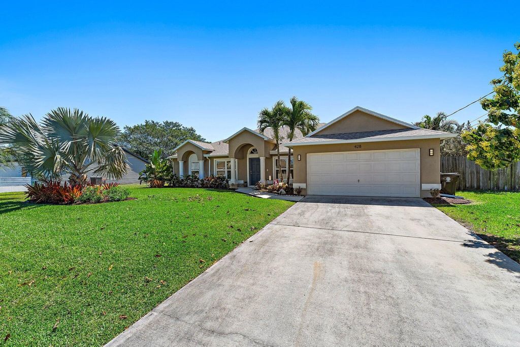 Photo of 428 SW Ryan Avenue, Port Saint Lucie, FL 34953 (MLS # R11096898)
