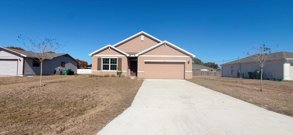 Photo of 525 SW Twig Avenue, Port Saint Lucie, FL 34983 (MLS # R11160481)