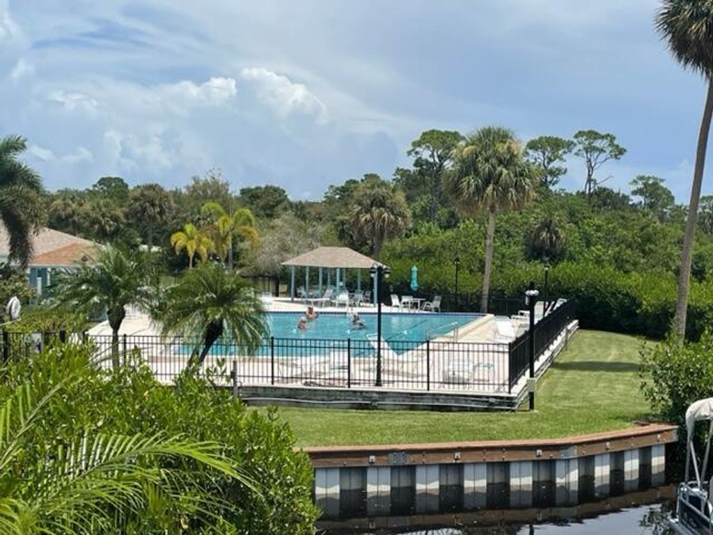 Photo of 1551 NE 13th Terrace #15, Jensen Beach, FL 34957 (MLS # R11099831)