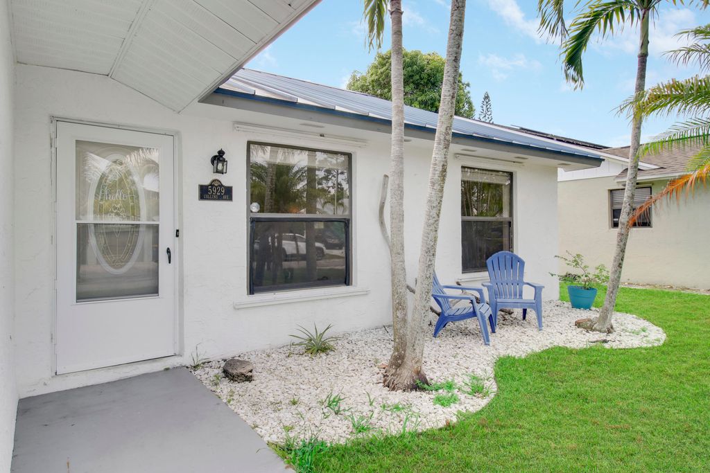 Photo of 5929 SE Collins Avenue, Stuart, FL 34997 (MLS # R11157267)