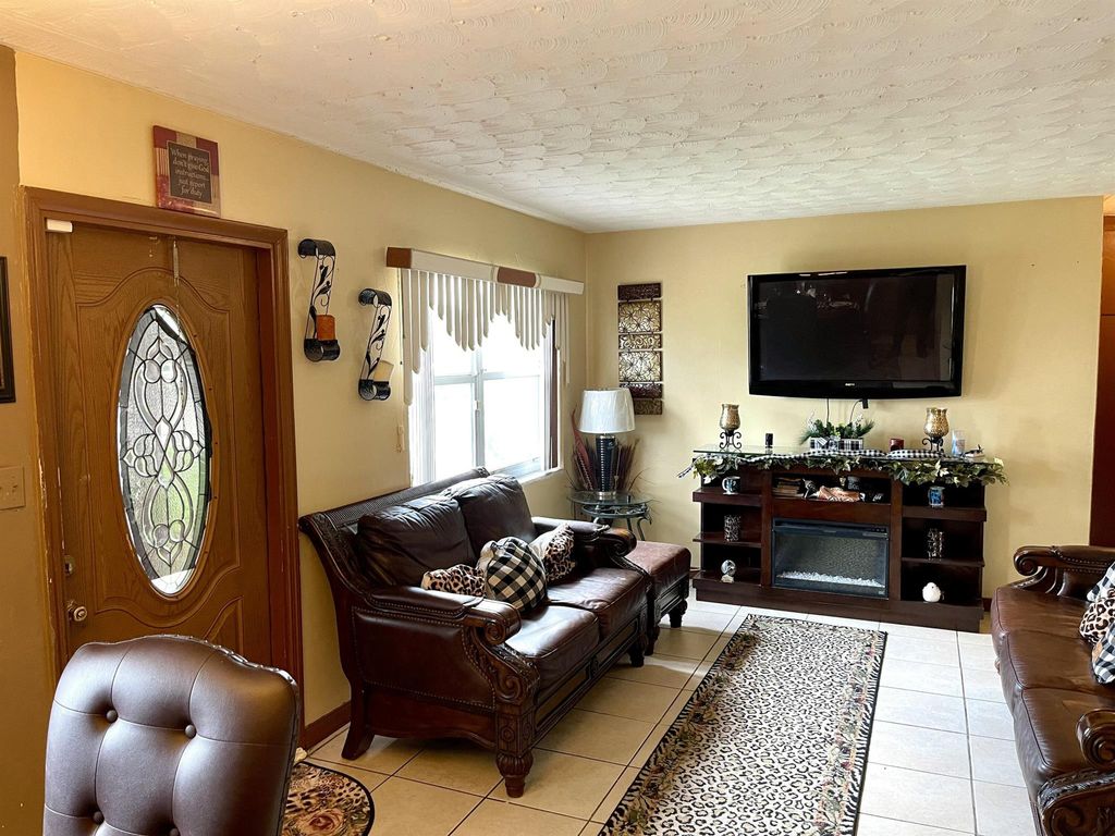 Photo of 616 SW 13th Street, Belle Glade, FL 33430 (MLS # R11094032)